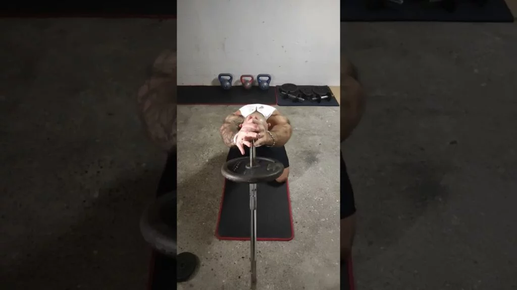 Développé épaule à genou landmine (kneeling landmine shoulder press)