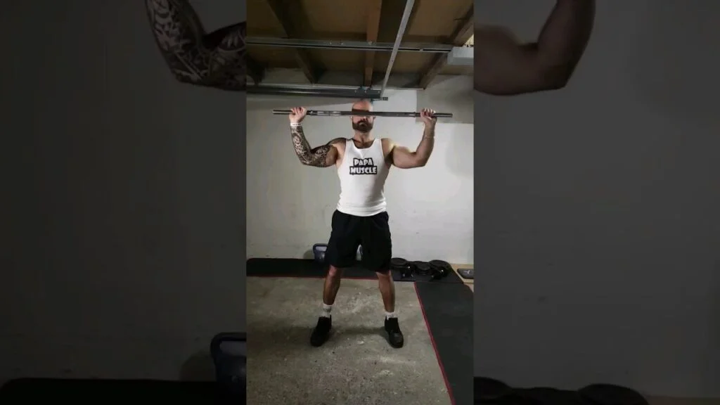 Rotation externe debout barre (standing barbell external rotation)