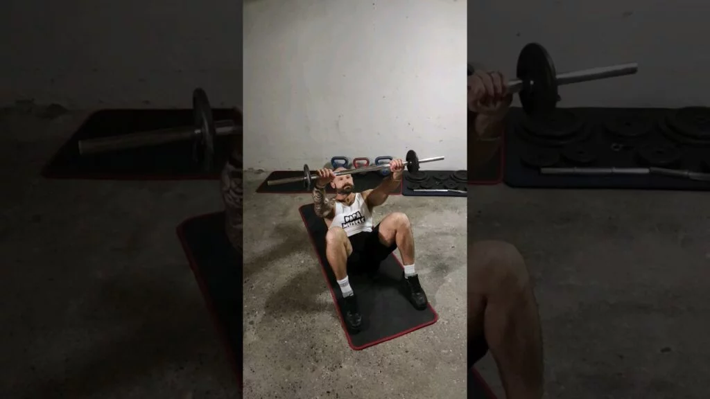 Crunch au sol barre (barbell floor crunch)