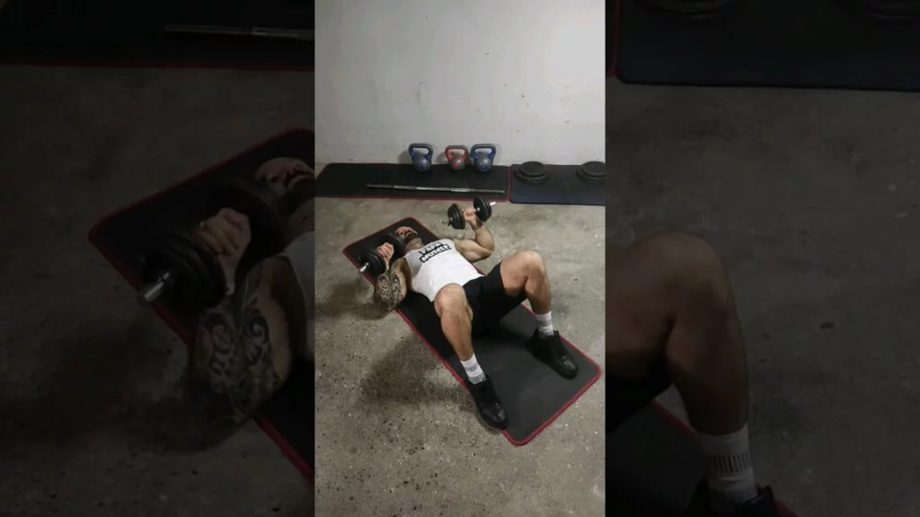 Développé couché au sol haltère (dumbbell floor press)