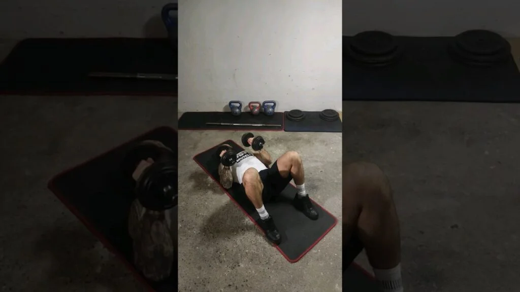 Développé couché au sol haltère prise neutre (neutral grip dumbbell floor press)