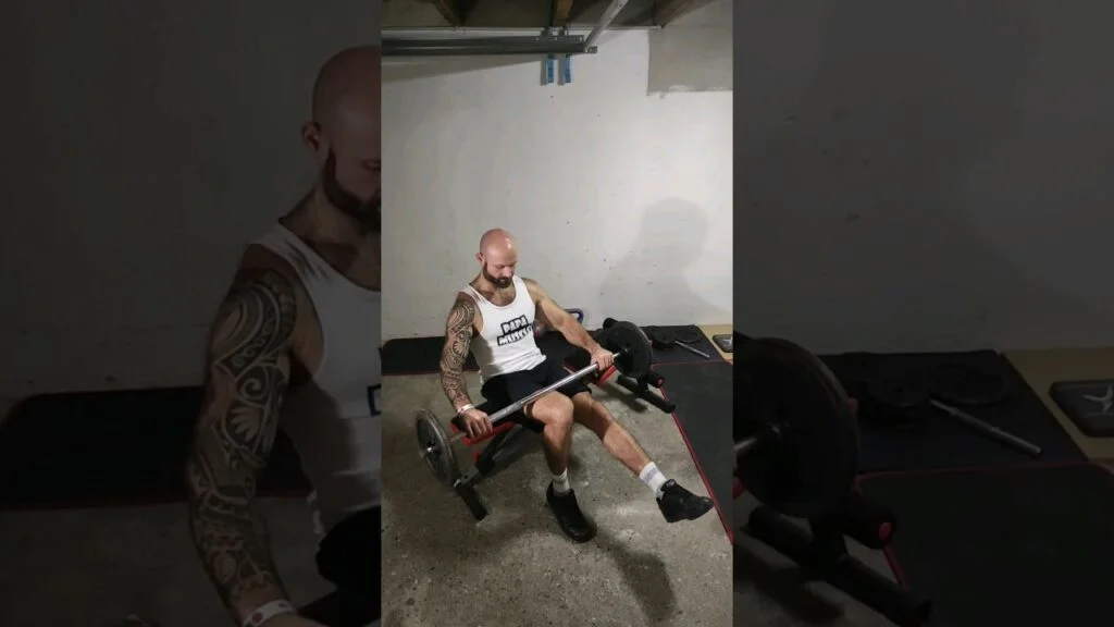Extension mollet assis barre Ă 1 jambe (seated barbell one leg calf raise)