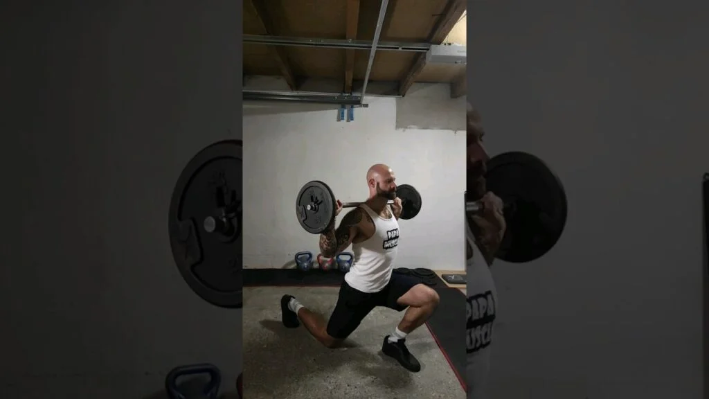 Fente avant barre (barbell forward lunge)