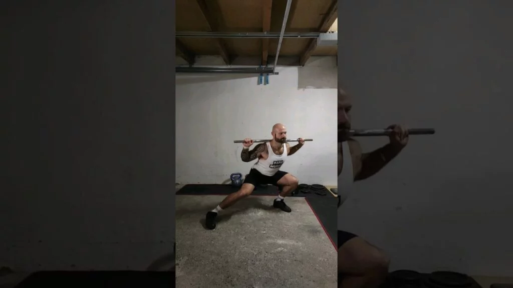 Fente latérale barre (barbell lateral lunge)