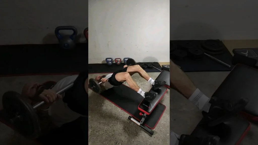 Relevé de bassin surélevé barre (barbell elevated glute bridge)