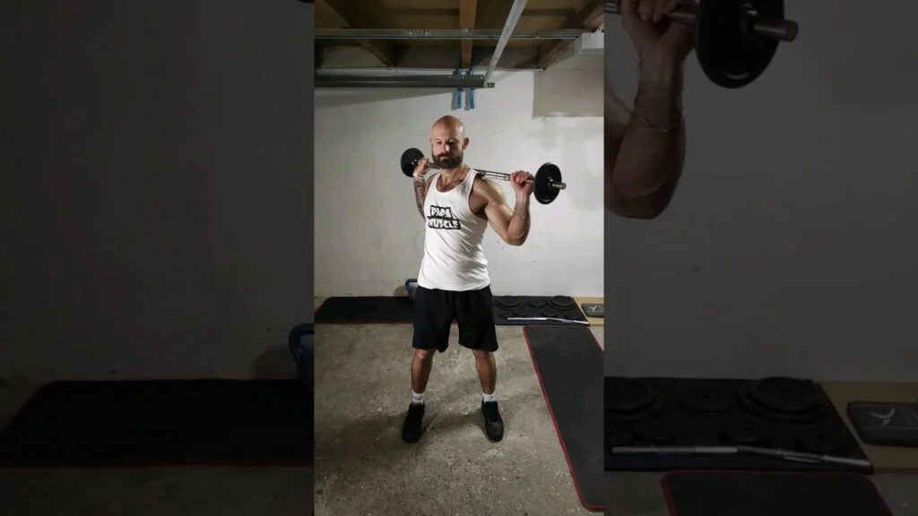 Rotation buste debout barre (standing barbell torso rotation)