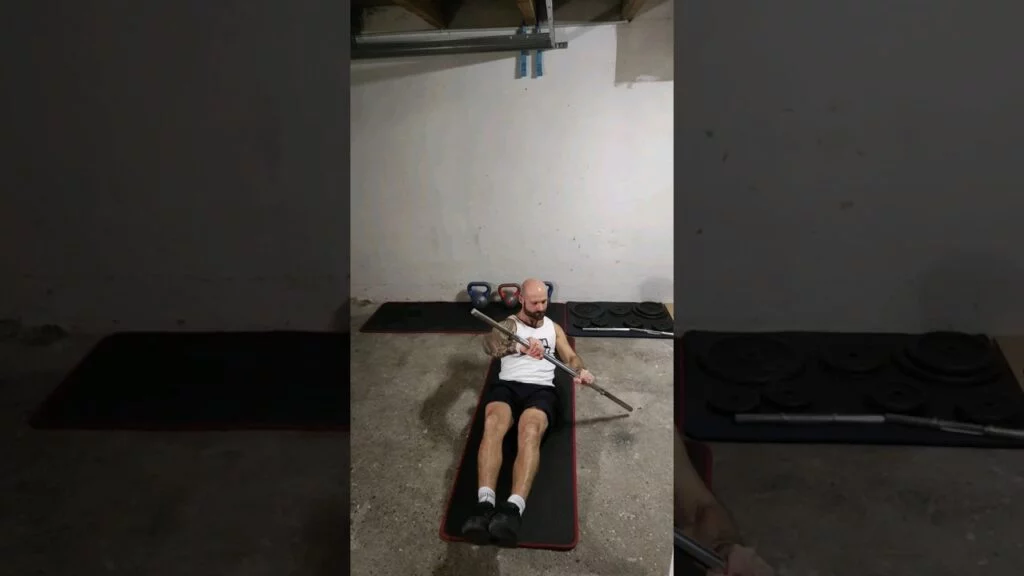 Rotation russe barre au sol (barbell floor russian twist)