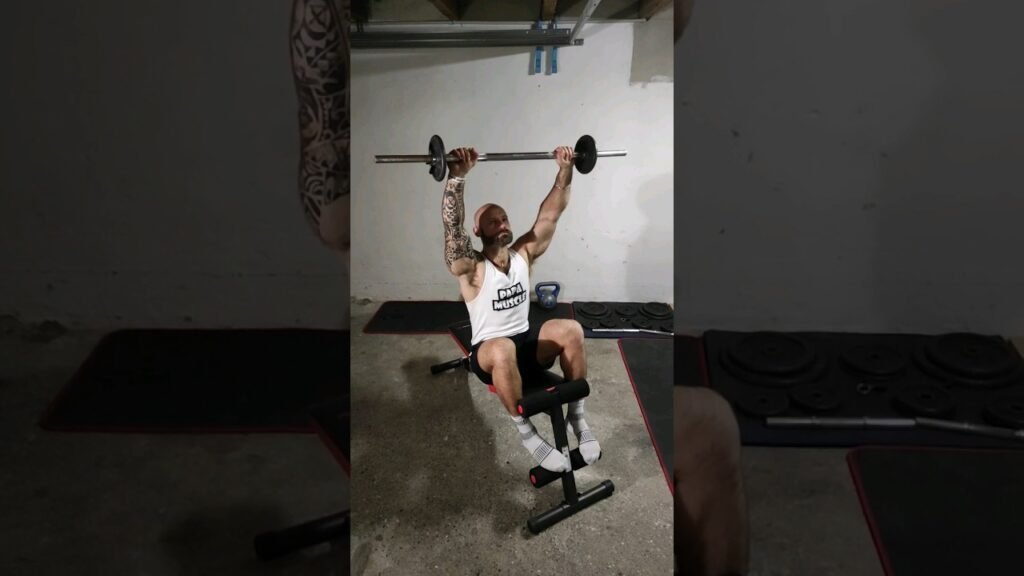 Sit-up barre sur banc (barbell bench sit up)