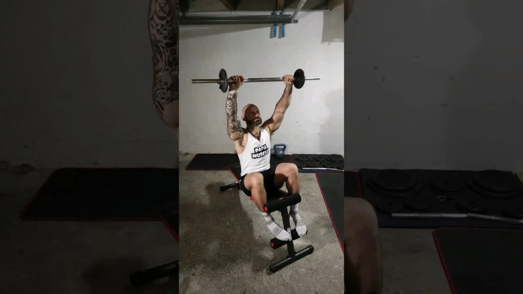 Sit-up barre sur banc (barbell bench sit up)