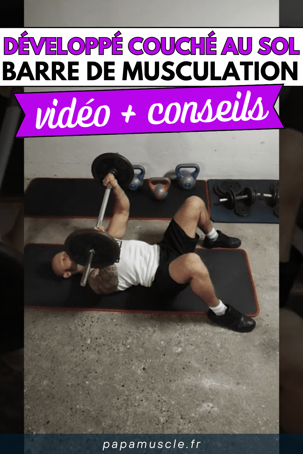 développé couché au sol barre