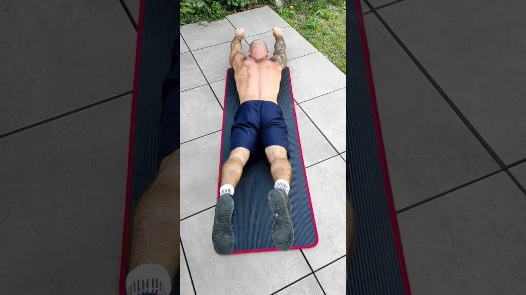 Traction Superman au sol (Superman lat pull-down)