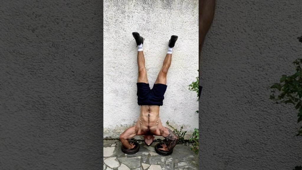 Pompe poirier surélevée (elevated hand stand push-up)